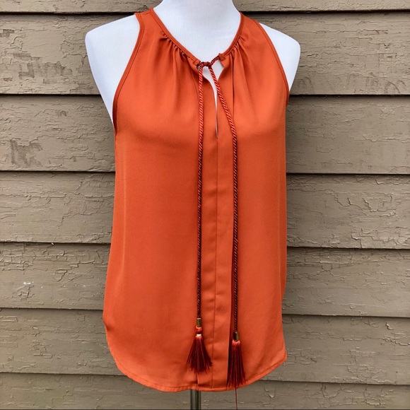 Lily White Tops - Lily White rust colored tassel cord top!